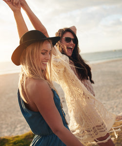 Friends in the sun at the beach.